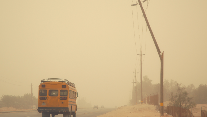 school bus on a dusty road