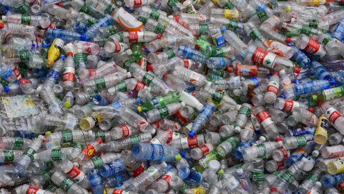 Tons of plastic bottles at a recycling facility in China